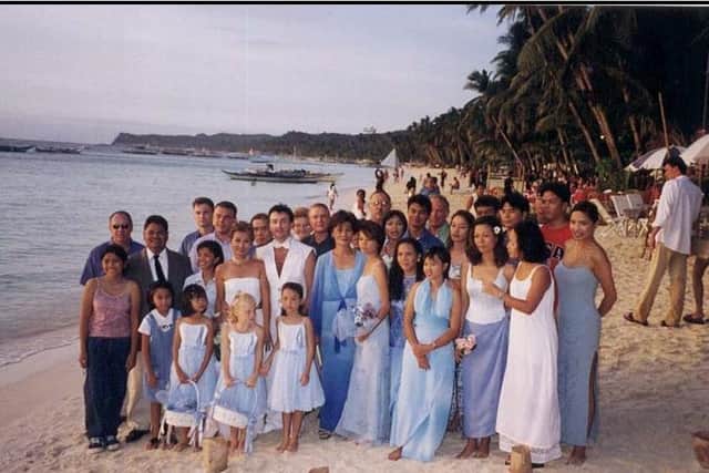 Trevor and Agnes' wedding on the beach in 1999