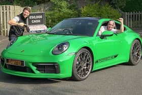 Kenneth Hindle behind the wheel of the Porsche 911 Turbo he won thanks to online competitions company BOTB. Kenneth, from east Lancashire, was presented with the car and £50,000 in cash by BOTB's Christian Williams (right)