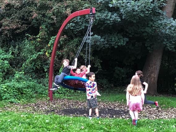Youngsters enjoy the play park during the swapshop.