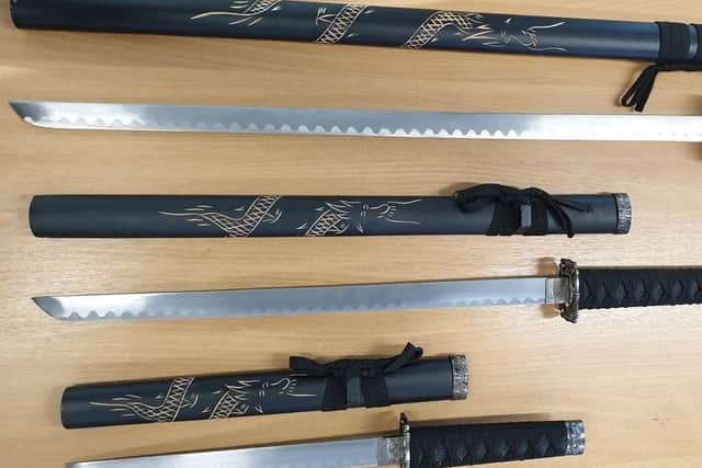 A collection of samurai swords were seized by police after being discovered by a member of the public in Lancaster. (Credit: Lancashire Police)