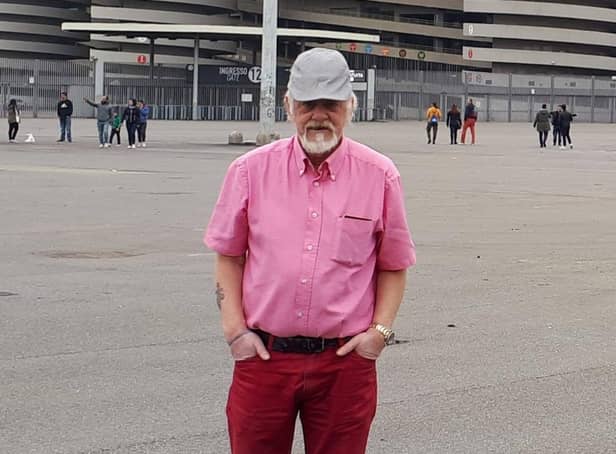 Colin Walker pictured outside the San Siro stadium in Milan.