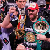 Referee Russell Mora holds up the arm of Tyson Fury as he celebrates his 11th-round knockout of Deontay Wilder to retain his WBC heavyweight title at T-Mobile Arena on October 9, 2021 in Las Vegas, Nevada.
