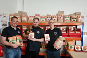 (Left to right) Andy Irvine (co-director), Charlie Howard (operations manager) and Elvis the dachshund, Darren Clunie (co-director),