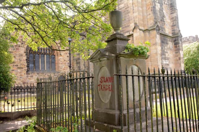 The Rawlinson family memorial in Lancaster Priory churchyard which was daubed with paint last year. Picture by Darren Andrews.
