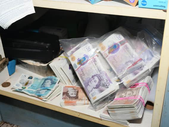 Some of the cash found during the raids.