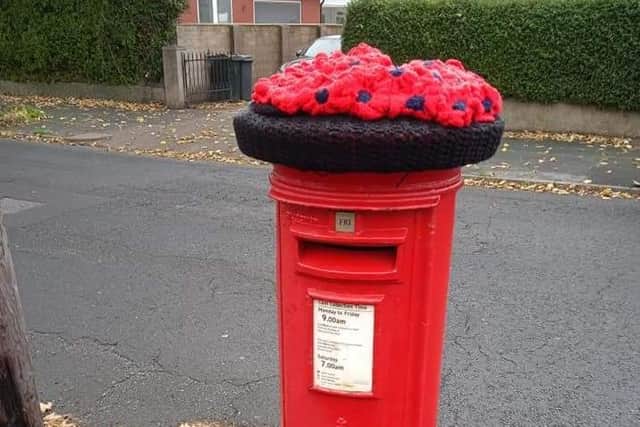 The poppy postbox cover made by Carla Bonness for the postbox on Balmoral Road.
