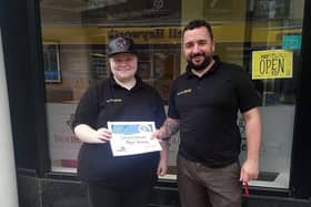 Volunteer Jaymie Armstrong with Joseph Gardiner at Brew Me Sunshine cafe in Morecambe.
