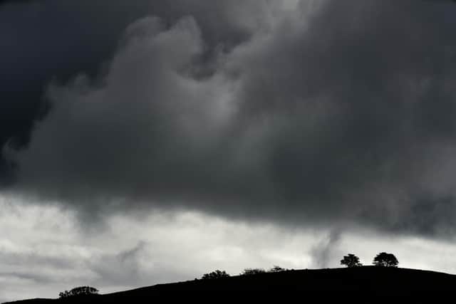Dark clouds over Tarn Hows, Ambleside in October 2020 (Picture: PA Wire/PA Images/John Walton)