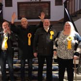 The winning Lib Dem candidates in the Morecambe Town Council by-election were Bill Jackson (fourth from the left) and Louise Stansfield (fifth from the left).