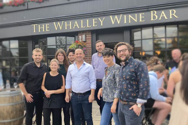 A successful team - Tom and Jen pictured (front row right)  with staff outside the Whalley Wine Bar earlier this year