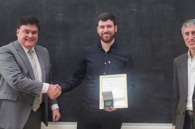 Professor George Aggidis (left) and Professor Claudio Paoloni congratulate James Beadle who received the IMechE: The Frederic Barnes Waldron ‘Best Student’ Award