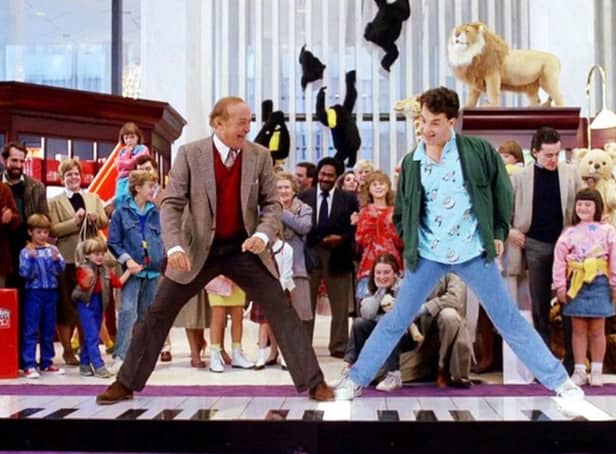 The late Robert Loggia and Tom Hanks try out The Big Piano in the famous scene from the movie Big. Credit: Let It Snow Globe