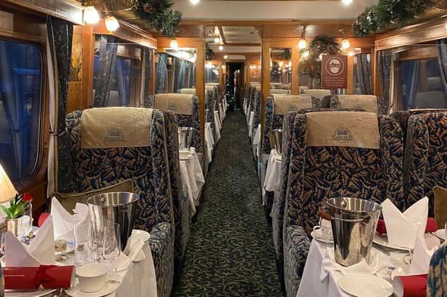 The empty Christmas-decorated carriages.