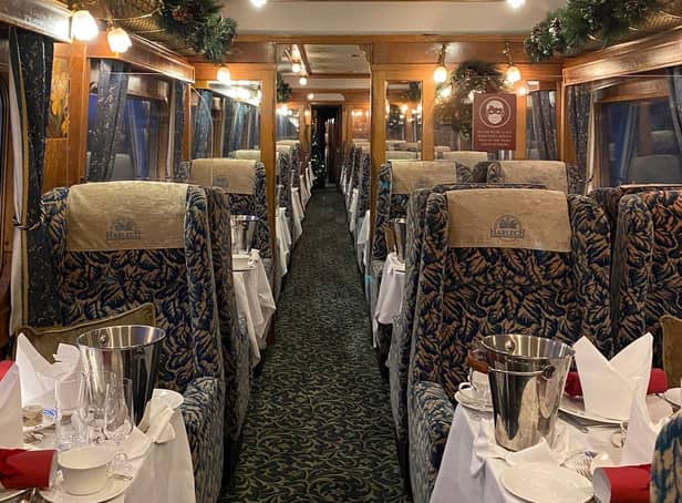 The empty Christmas-decorated carriages.