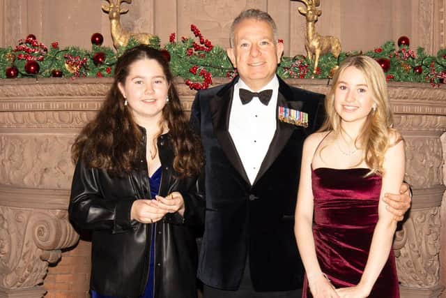Neil Jurd with daugthers Elsa (left) and Tildy (right) at the charity ball