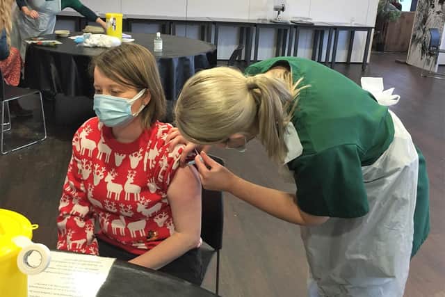 Jessica from Crosthwaite receives her vaccine.