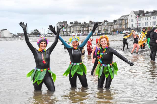 'Serious swimmers' took to the sea in wetsuits, some braved it in swimwear. Photo credit: Keith Douglas Photography