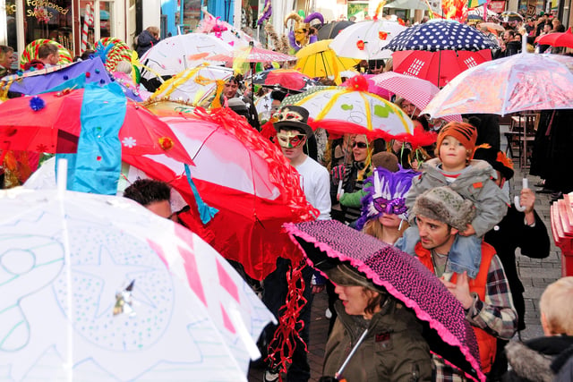 George Street, Hastings. Start of Fat Tuesday procession going to Robertson Street.
19.02.12.
Picture by: TONY COOMBES PHOTOGRAPHY
Colourful umbrellas in George Street ENGSUS00120120220091914