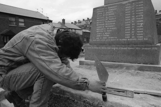 A workman attending to the Bloody Sunday memorial in 1997.