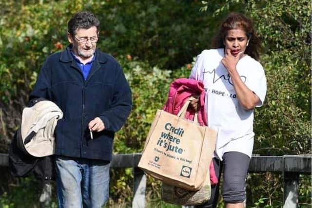 CARRONSHORE. Carronshore Road. The Shore. Douglas Traynor and Shanti Traynor who were running The Shore have been evicted today Tuesday, October 3. The couple are pictured walking away from Carron towards Falkirk. Picture Michael Gillen.