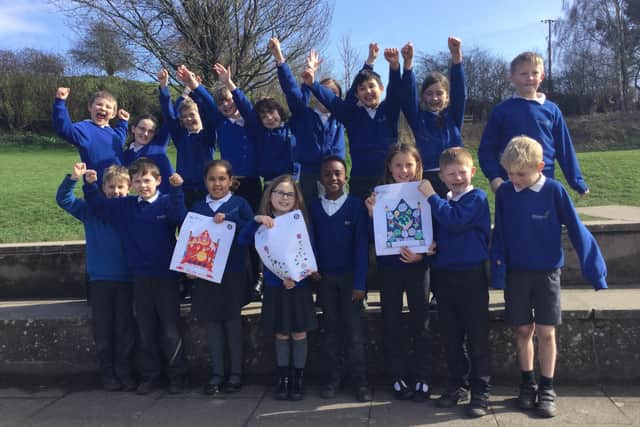 Thrilled Year 4 art competition winners at Milnthorpe Primary School.