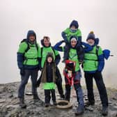 Six-year-old from Lancaster Oscar Burrow, who is climbing the equivalent of Mount Everest, has hit his £29,000 fundraising target which will go towards Derian House Children's Hospice in Chorley. Oscar is pictured with his friend Ollie and the gang climbing Blencathra