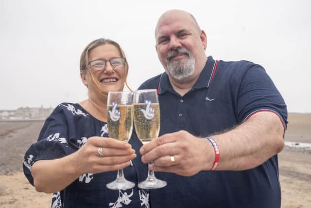 Helen and Lee Kuchczynski, from Cumbria, during a photo call to celebrate their £3.6 million EuroMillions win, in Morecambe, Lancashire. Picture date: Friday July 22, 2022. PA Photo. See PA story LOTTERY EuroMillions. Photo credit should read: Danny Lawson/PA Wire
