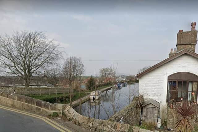 The robbery happened on the canal towpath near Hest Bank Lane. Picture from Google Street View.