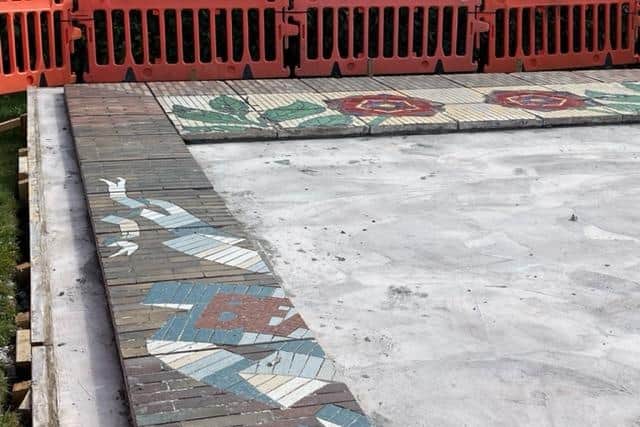 Morecambe's popular mosaic is being restored to its former glory on the promenade. Picture by Michelle Blade.