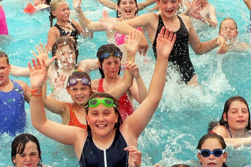 Youngsters enjoying the Big Splash at Bubbles leisure pool in Morecambe during a Lancaster Leisure Services Playscheme.