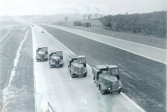 This image from a glass plate negative shows the Lancaster stretch of M6 ahead of being opened by the Chancellor of the Duchy of Lancaster, Dr Charles Hill MP. on April 11 1960. Road Sweepers, moving south along the northbound lane, remove lose stones, mud and dirt as part of the final preparations for the official opening.