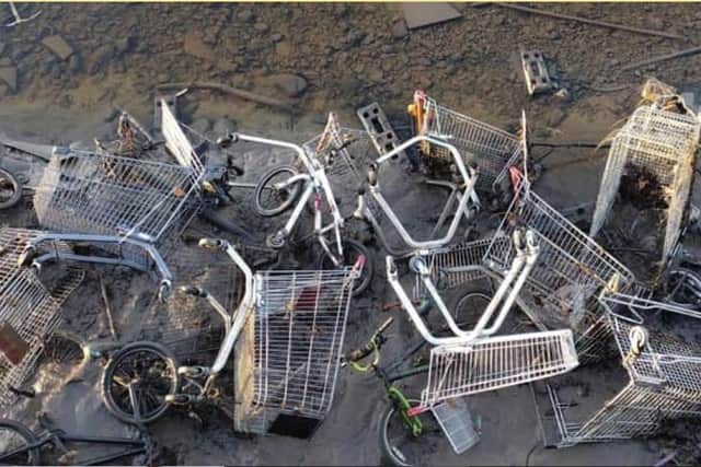 Dumped trolleys in the River Lune are an eyesore.
