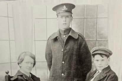 William Bull (centre), in the uniform of the Royal Artillery. Left his mother Sarah, right Edward Bull. Picture courtesy of David Kenyon.
