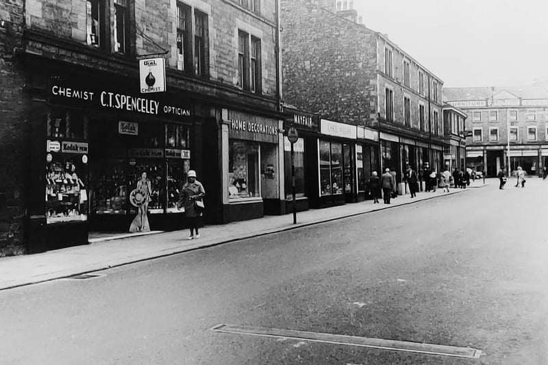 A view of Common Garden Street showing 1950s shops that are long gone.