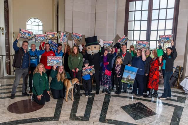 Some of the charities and organisations who appear on the new Lancaster version of Monopoly celebrate the launch of the game along with mayor Roger Dennison and Mr Monopoly.
