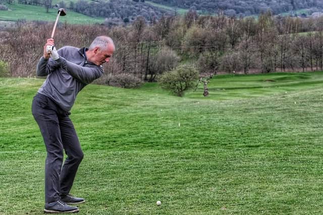 New club captain Joe Bowman drives off the first tee using a ceremonial hickory-shafted club at Kirkby Lonsdale Golf Club. Picture by Robin Ree