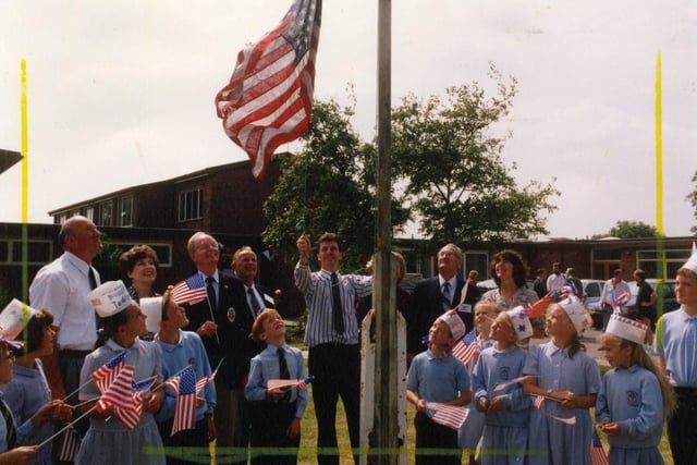 Headteacher David Charles hoists the Stars and Stripes at Freckleton C of E School. The village has a long association with America, after thousands of Americans were posted there during the Second World War