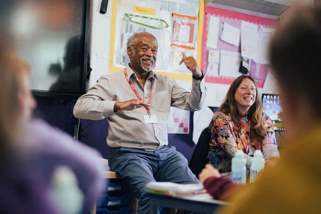 Clinton Smith, Preston Black History chair, at Willow Lane Primary School to mark Windrush 75. Photo by Robin Zahler.