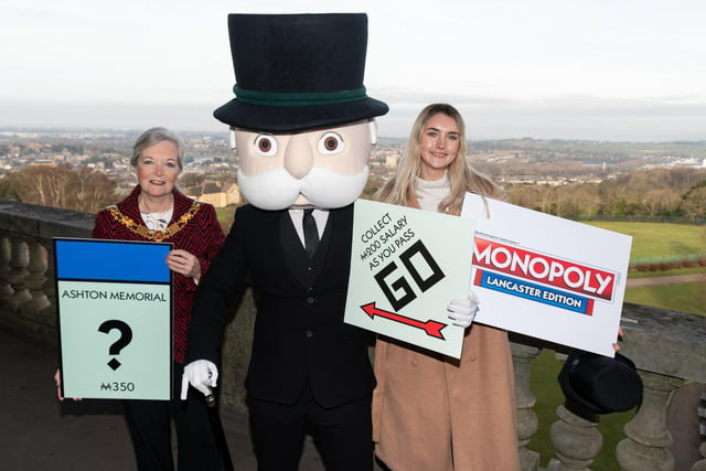 The Mayor of Lancaster Coun Joyce Pritchard with Mr Monopoly and Ella Gibbs, Game Maker, Winning Moves, at the launch event of Lancaster's version of Monopoly.