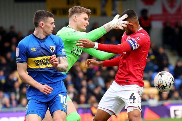 Archie Mair (centre) returns to Morecambe after a previous loan spell Photo: Andrew Redington/Getty Images