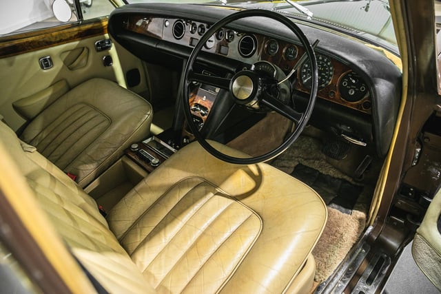 The interior of the Rolls Royce Silver Shadow is beige. Picture from Iconic Auctioneers.