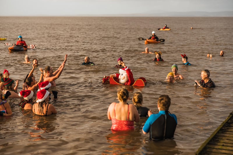 Even Father Christmas took part in the New Year's Day Dip in Morecambe Bay.