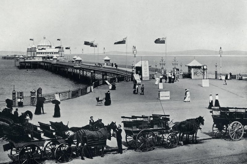 The West End Pier, with Union Jacks flying out in the breeze.