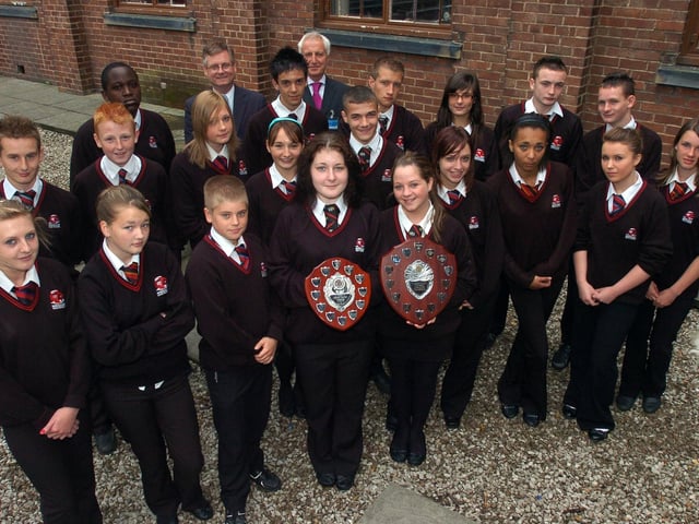 Some of Morecambe High School's award winning middle school students pictured before their prizegiving evening, with head and deputy head Mr John McNaughton and Mr John Worth.