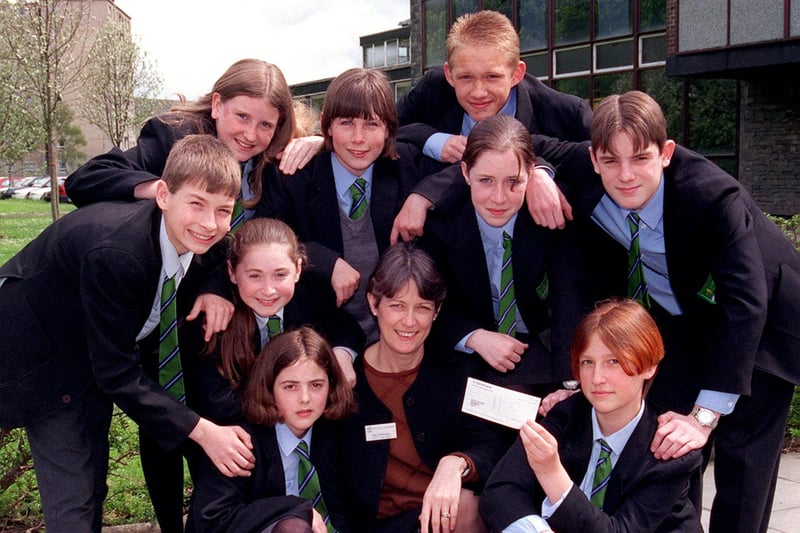 Pupils from Our Lady's High School, Lancaster, who raised £1,020 through various events for the Catholic Caring Services, with their teacher Alice Robinson, in 1998.