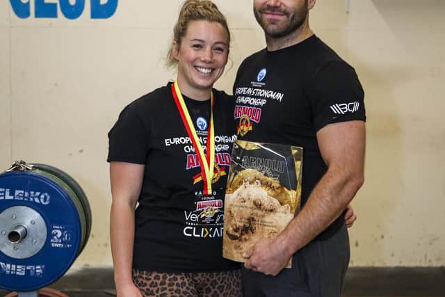 Strongman and strongwoman competitors who were both crowned European champs on the same day, Josh with his partner Molly at their gym, the Lean Body Strength Club in Morecambe,. Photo: SWNS
