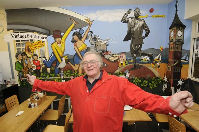 Artist Bob Pickersgill has painted a mural inside The Star Cafe at the Festival Market.