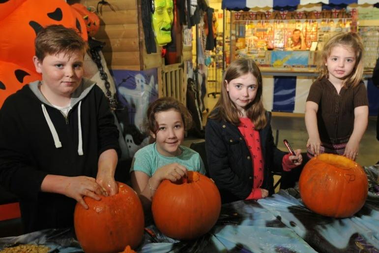 A pumpkin carving and Halloween family activity day at Festival Market, Morecambe. Pictured are Callum Kennedy, Emily Salt, Kendra and Violet Bushell.
