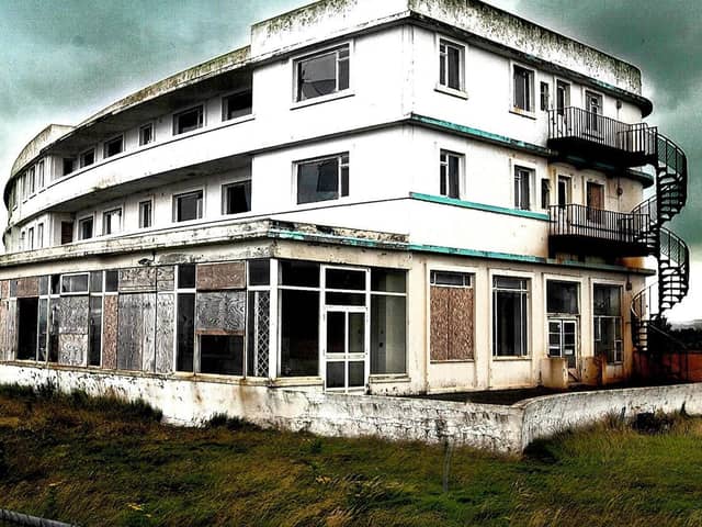 The derelict hotel was a sad sight.