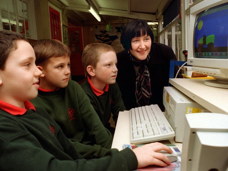 Pupils from Lancaster Road School in Morecambe, from left, Anthony Duckworth, Johnny Durnan and Mathew Swann, show Geraldine Smith, the MP for Morecambe and Lunesdale, their computer skills during her visit to the school.